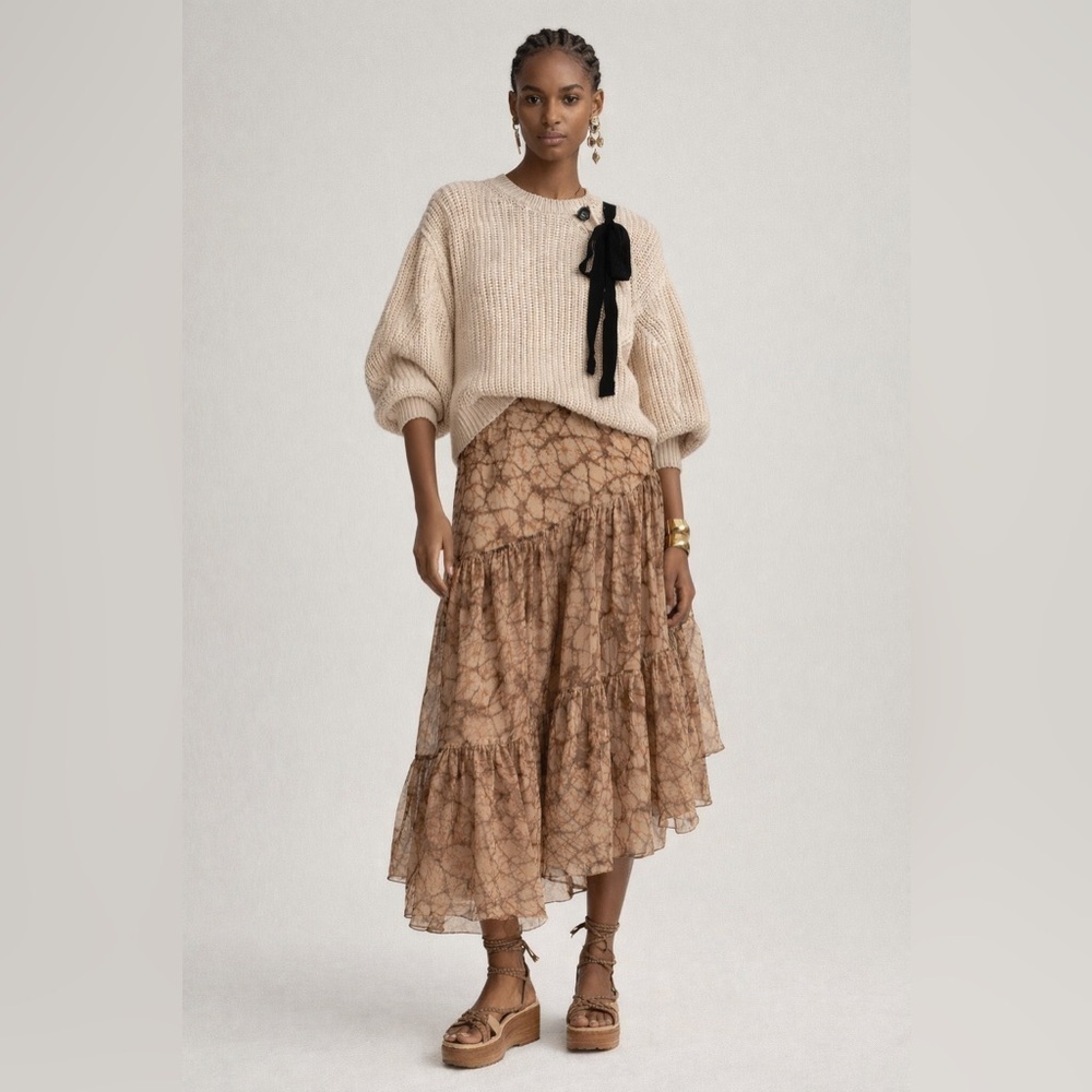Ulla Johnson cream colored sweater with black ribbon tie detail at neck. Size S